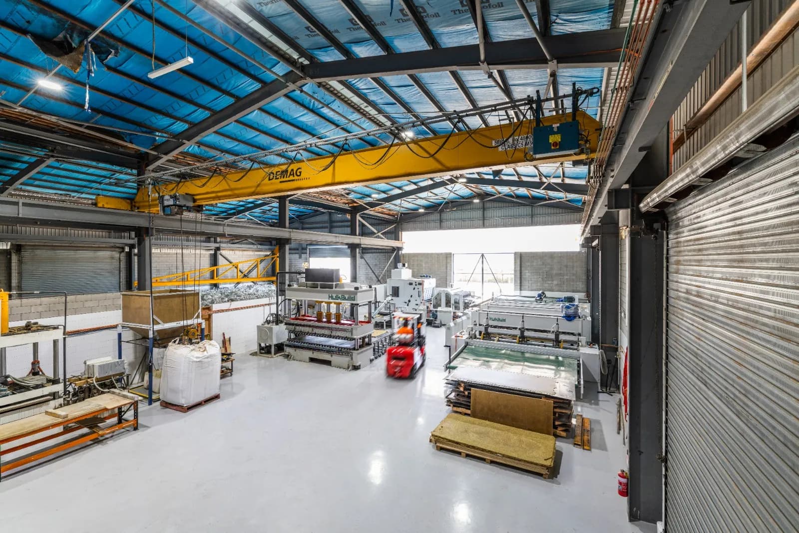 Factory floor overview with overhead crane at the Townsville facility